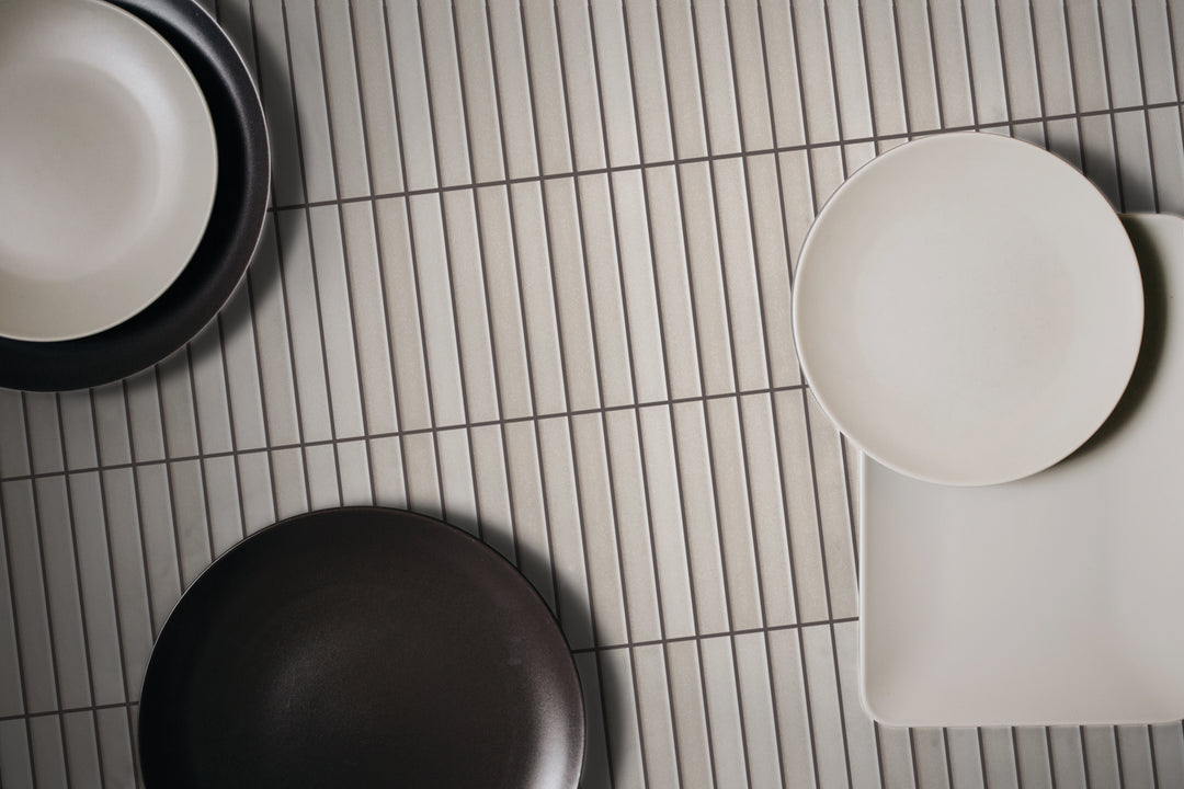 A calming, earthy ambiance with Roku Greige 4.5X9 Matte Porcelain, adding warmth and depth to a variety of interiors.