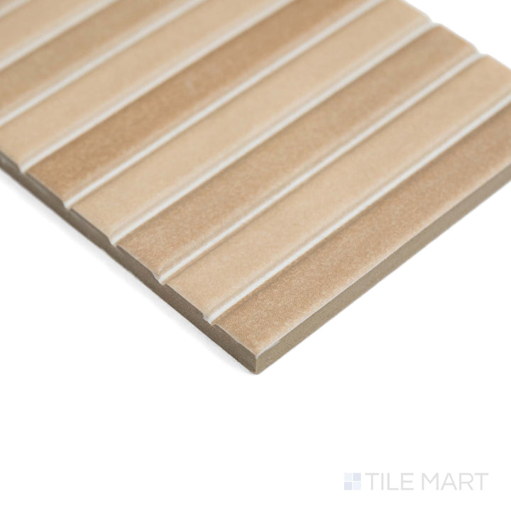 A corner shot emphasizes Roku Beige 4.5X9 matte porcelain, revealing warm neutral hues and smooth texture.