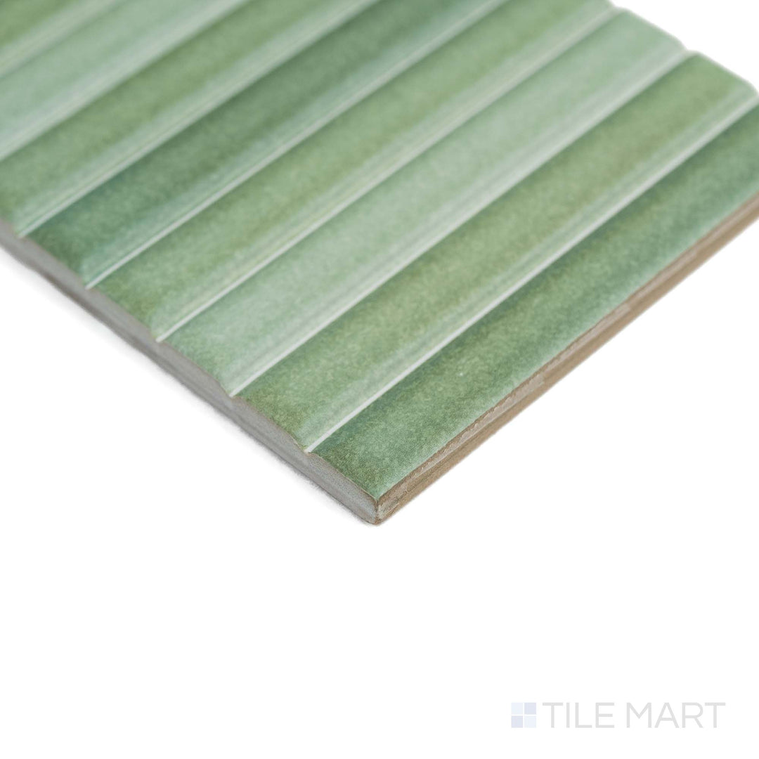 In this angled view, Roku Green tile displays its earthy matte surface with subtle sophistication.