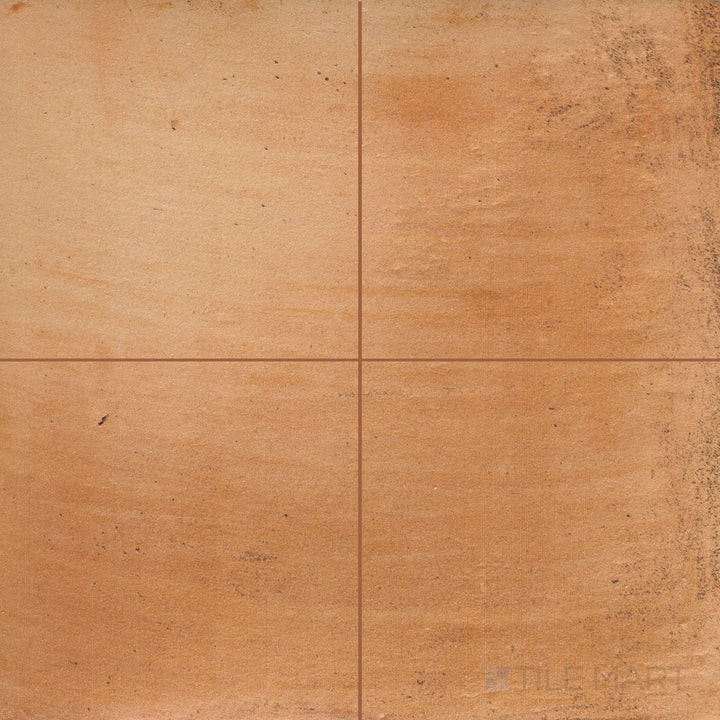 Overview shot of Fuego Antic 18x18 matte porcelain tiles arranged side by side, highlighting their rustic surface variation and warm, aged look.