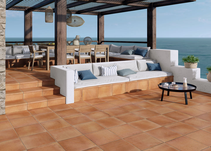 Fuego Antic 18x18 matte porcelain tile in a real application, presenting its rustic surface detail and aged stone style across a traditional layout.