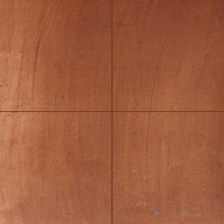 Multiple Fuego Teja 18x18 matte porcelain tiles shown in a layout, featuring rich terracotta tones and a natural matte texture across the surface.