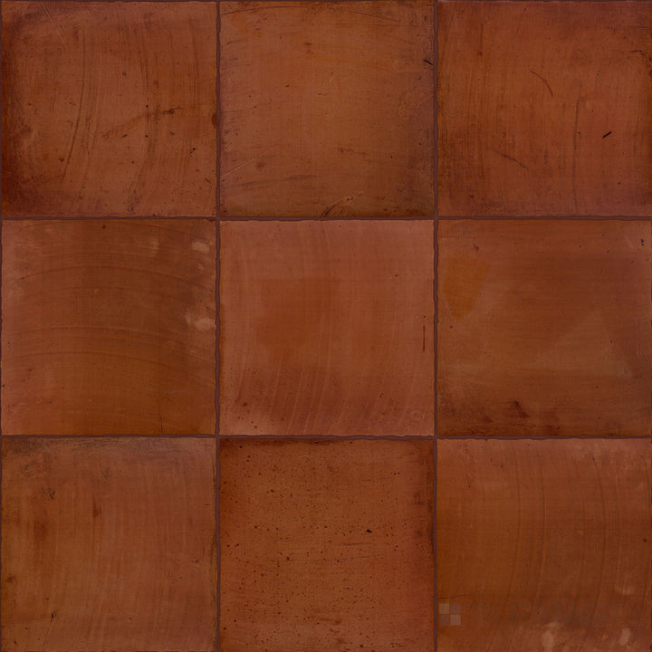 Fuego Teja 9x9 matte porcelain tiles displayed in a group layout, emphasizing warm clay-like tones and the textured, matte surface variation.