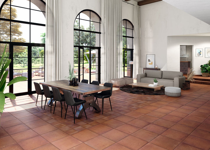 Fuego Teja 9x9 matte porcelain tile displayed in a completed surface, highlighting its warm clay color and subtle matte finish in a traditional layout.