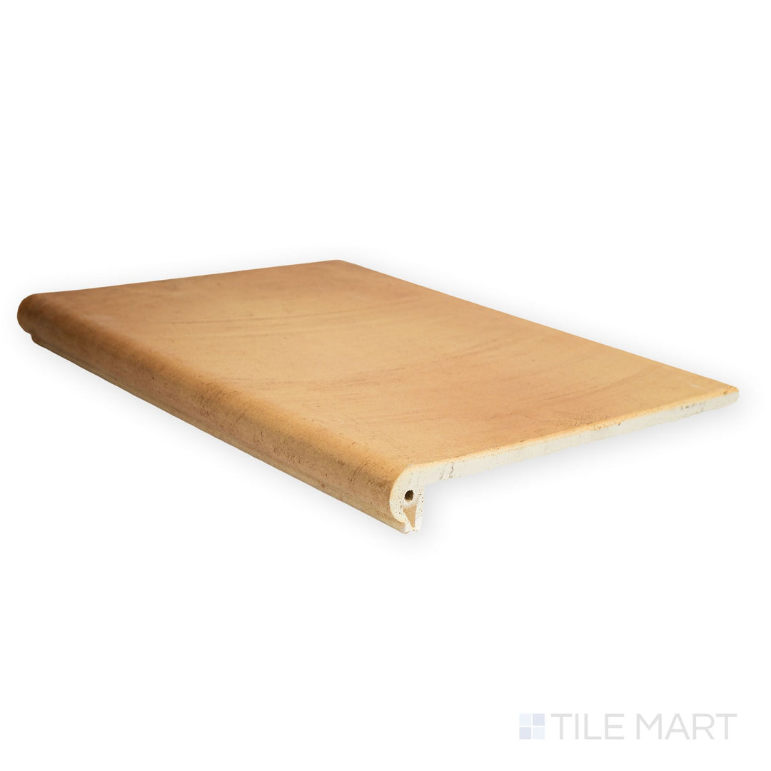 Seen from above, the Fuego Antic Stair Coping 13x18 matte porcelain tile showcases its full profile with aged stone coloring and rounded edge finish.