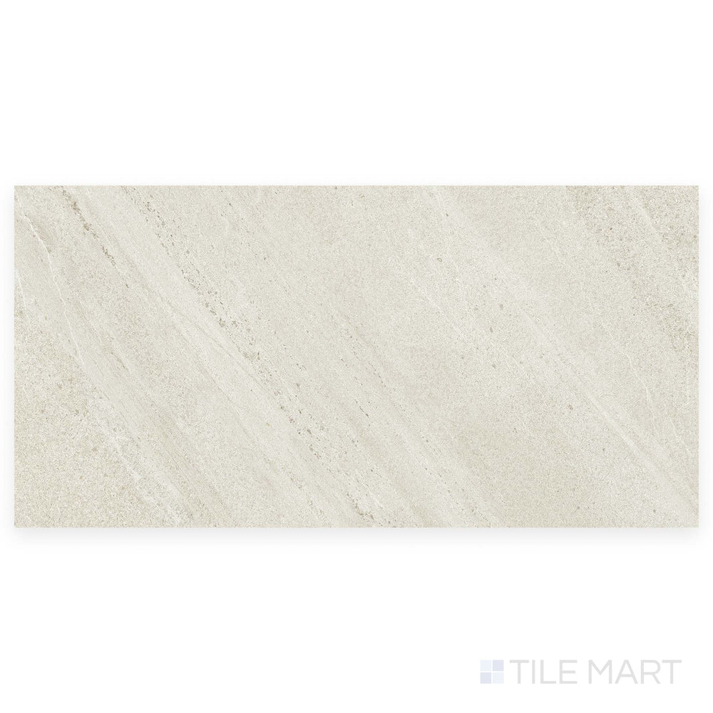 Top-down image of a single Nordic White 24x48 grip porcelain tile, revealing its lightly textured surface and soft stone-like color variation.