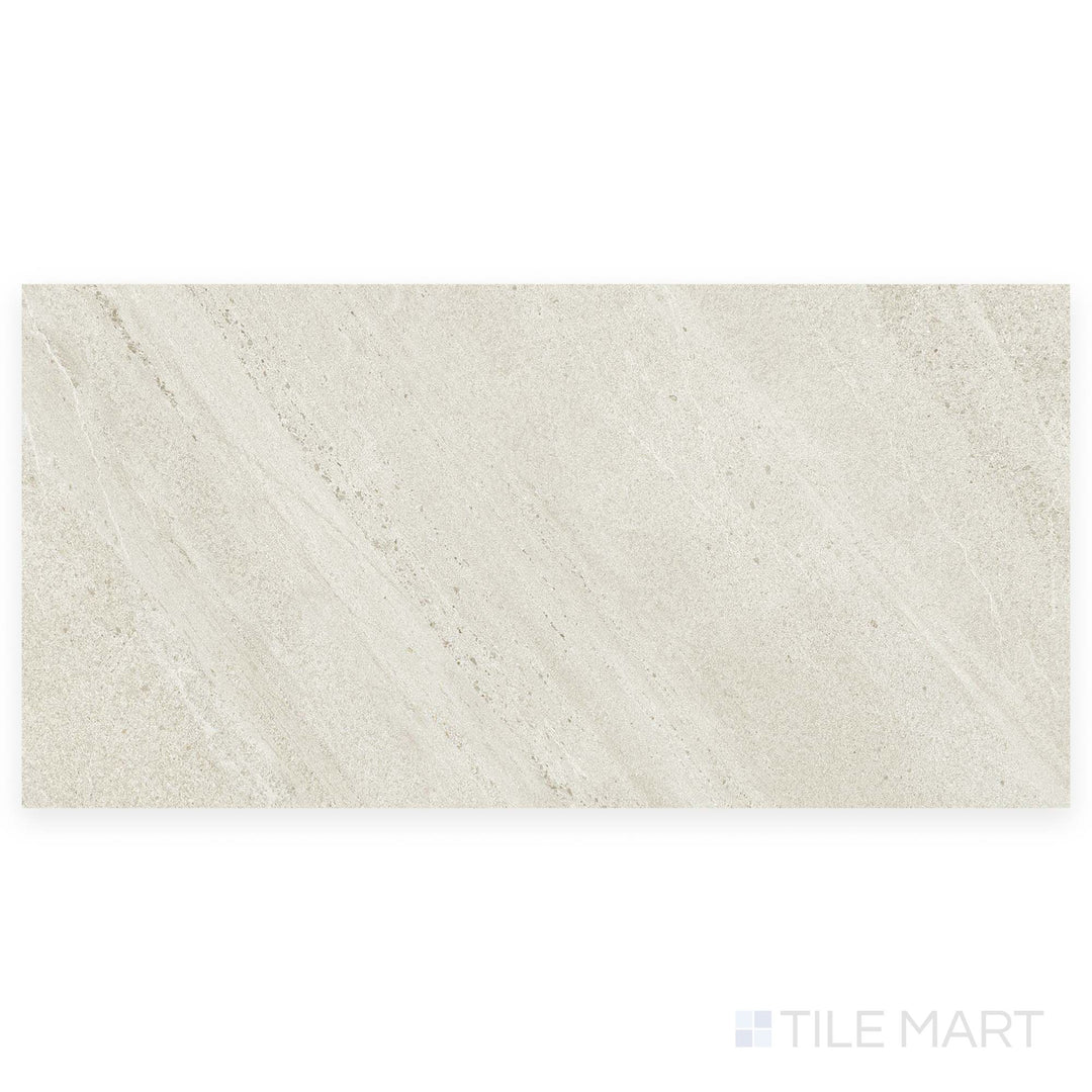 Top-down image of a single Nordic White 24x48 grip porcelain tile, revealing its lightly textured surface and soft stone-like color variation.