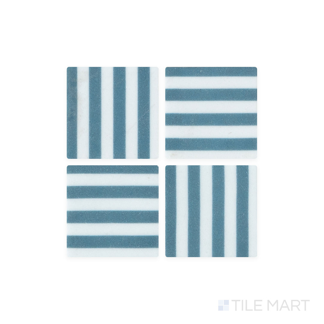 A close-up shot of Onix Glass - Icon Navy Blue 2" Square Bidart Matte Mosaic tile reveals its deep navy hue and subtle matte texture, offering a modern and elegant appeal.