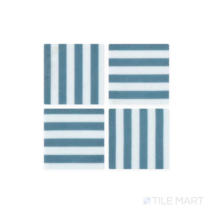 A close-up shot of Onix Glass - Icon Navy Blue 2" Square Bidart Matte Mosaic tile reveals its deep navy hue and subtle matte texture, offering a modern and elegant appeal.