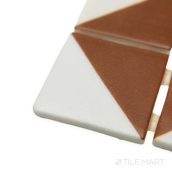 Angled view of Onix Glass Icon Ginger 2" square Origami matte mosaic, emphasizing its warm ginger shade, sharp geometric design, and seamless corner transition.