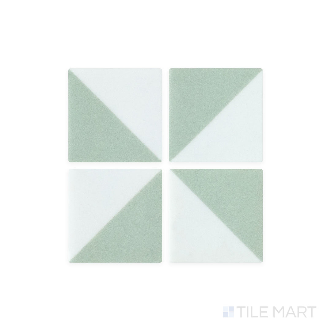 This close-up shot of Onix Glass - Icon Sage Green 2" Square Memphis Matte Mosaic tile enhances its muted green tone and fine matte finish, evoking a calming natural feel.