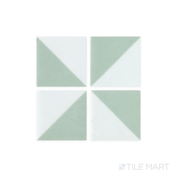 This close-up shot of Onix Glass - Icon Sage Green 2" Square Memphis Matte Mosaic tile enhances its muted green tone and fine matte finish, evoking a calming natural feel.