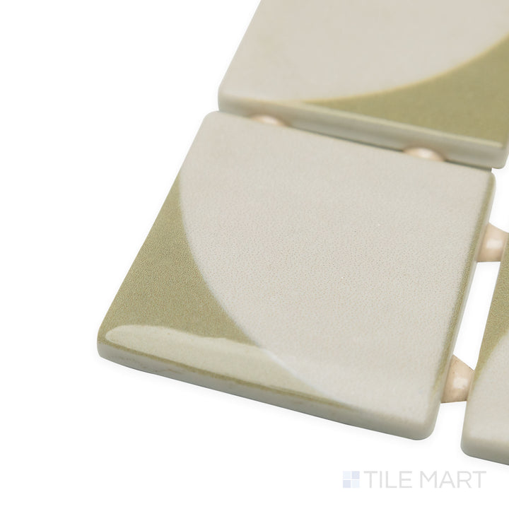 Angled perspective of Onix Glass Icon Cream 2" square Memphis matte mosaic, displaying its light beige tone, clean-cut edges, and soft matte surface meeting at a precise corner.