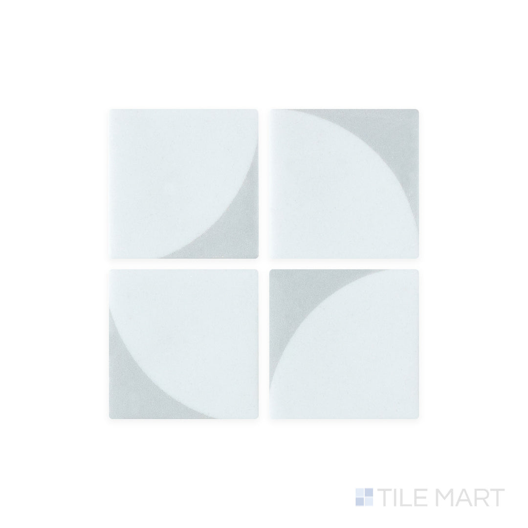 A macro shot of Onix Glass - Icon Light Grey 2" Square Memphis Matte Mosaic tile highlights its soft grey shade with a muted matte effect, creating a versatile, modern look.