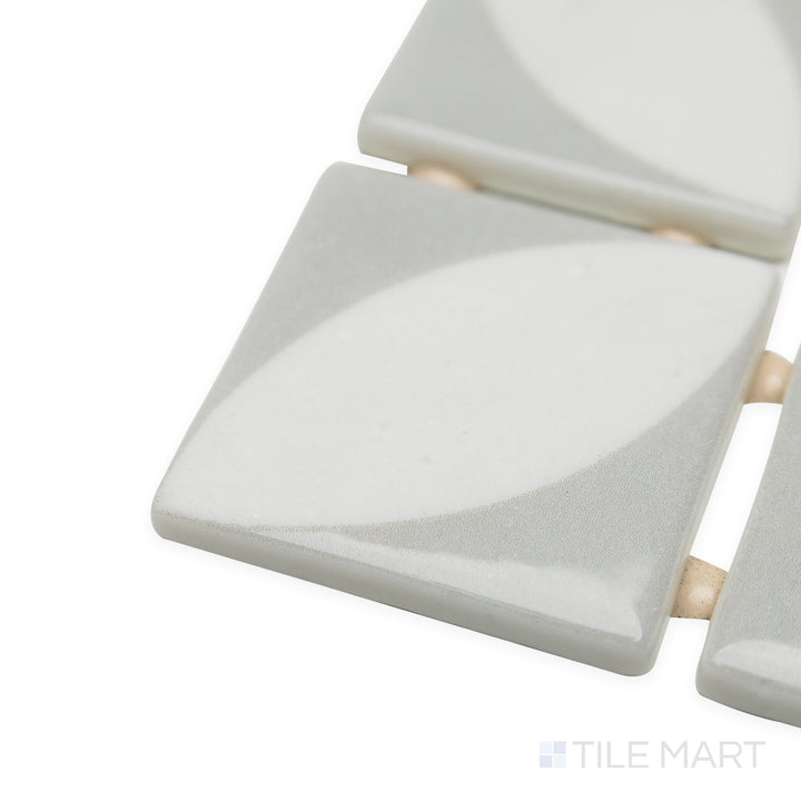 Corner shot of Onix Glass Icon Light Grey 2" square Azalea matte mosaic, displaying its cool grey shade, balanced texture, and sharp, well-defined corner formation.