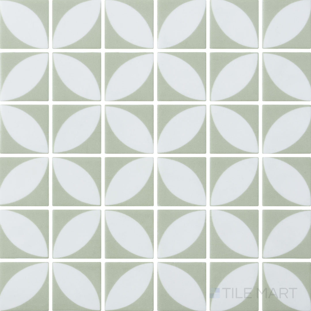 Flat-lay shot of Onix Glass Icon Olive Green 2-inch square mosaic tile with an Azalea matte finish, bringing a natural, earthy tone to interiors.