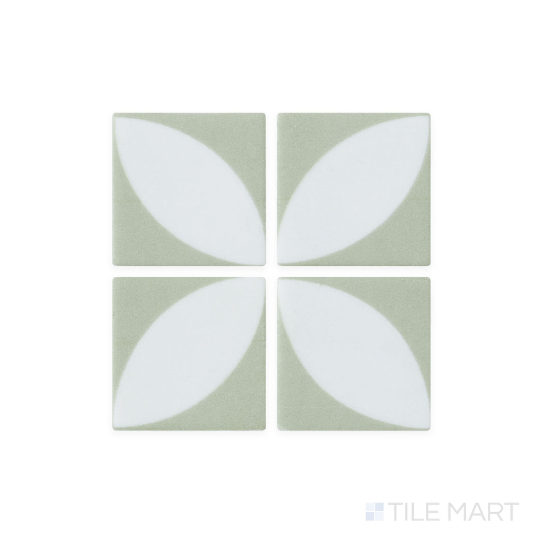 This close-up shot of Onix Glass - Icon Olive Green 2" Square Azalea Matte Mosaic tile enhances its earthy green shade and velvety matte texture for a natural aesthetic.
