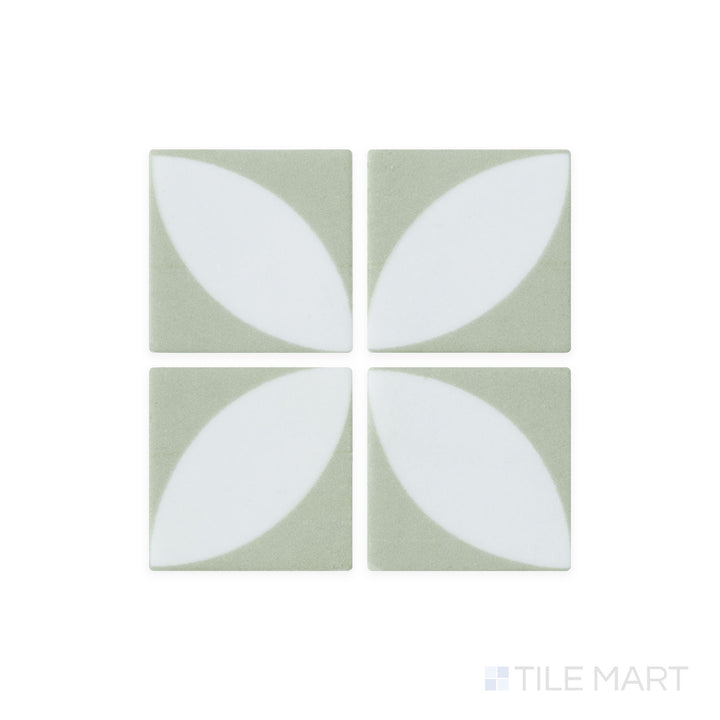 This close-up shot of Onix Glass - Icon Olive Green 2" Square Azalea Matte Mosaic tile enhances its earthy green shade and velvety matte texture for a natural aesthetic.