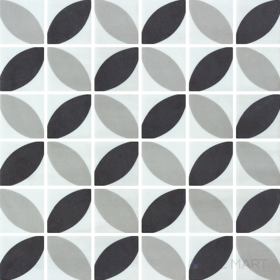 Flat-lay image of Onix Glass Icon Black 2-inch square Dahlia matte mosaic tile, showcasing a deep black shade with a contemporary matte texture.