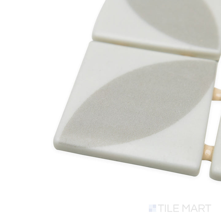 Angled view of Onix Glass Icon Light Grey 2" square Dahlia matte mosaic, highlighting its subtle grey finish, structured edge alignment, and a finely textured matte surface.