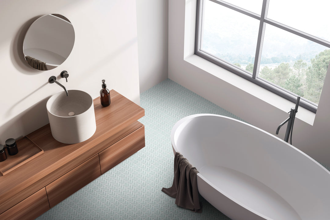 A sleek and versatile pattern that complements a variety of styles, featuring Onix Glass - Icon Light Grey 2" Square Chevron Matte, Gloss Mosaic.