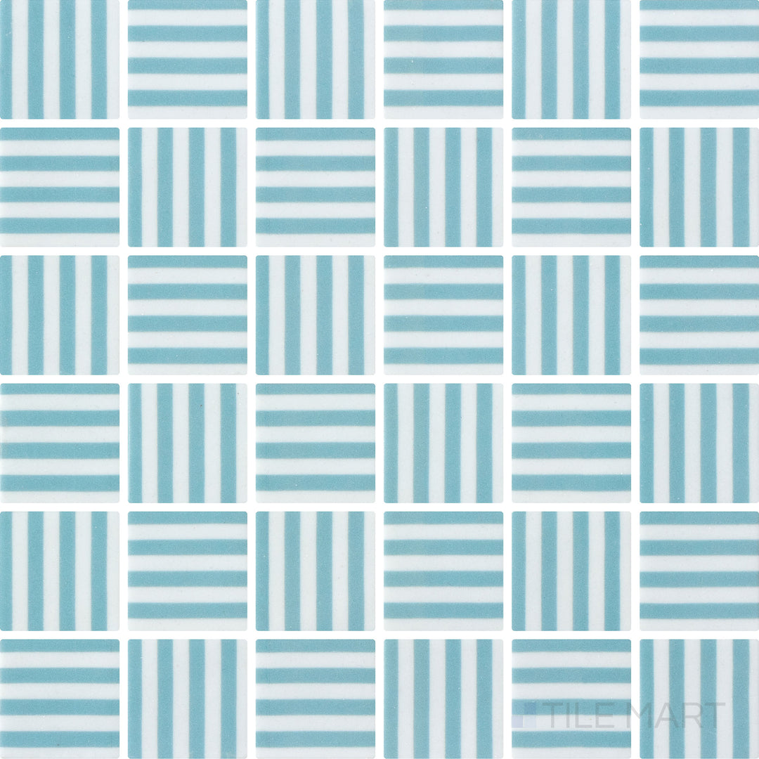 Flat-lay view of Onix Glass Icon Arctic Blue 2-inch square Bidart matte mosaic, displaying a cool blue shade with a smooth matte texture.