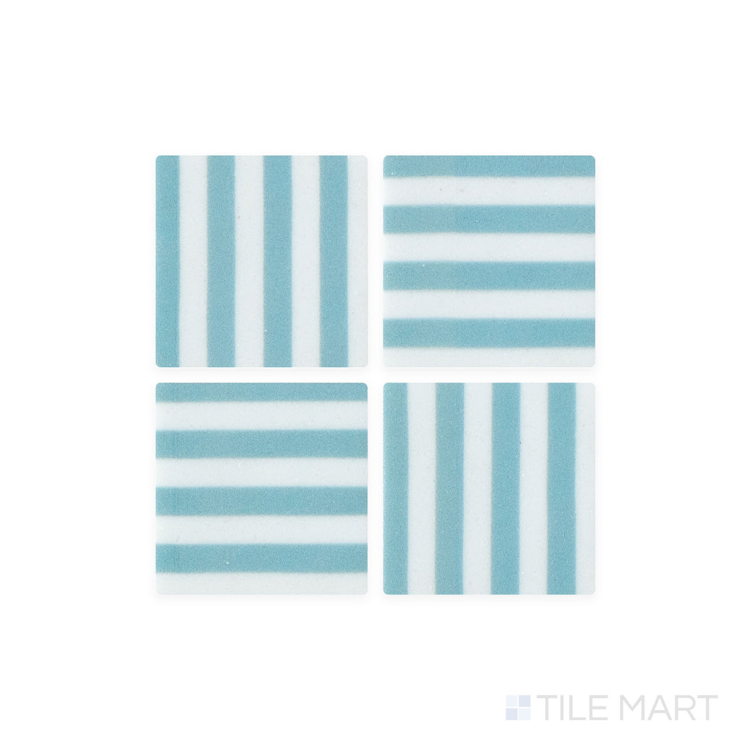 A macro view of Onix Glass - Icon Arctic Blue 2" Square Bidart Matte Mosaic tile captures its crisp arctic blue tone and velvety matte surface, adding a fresh, cool elegance.