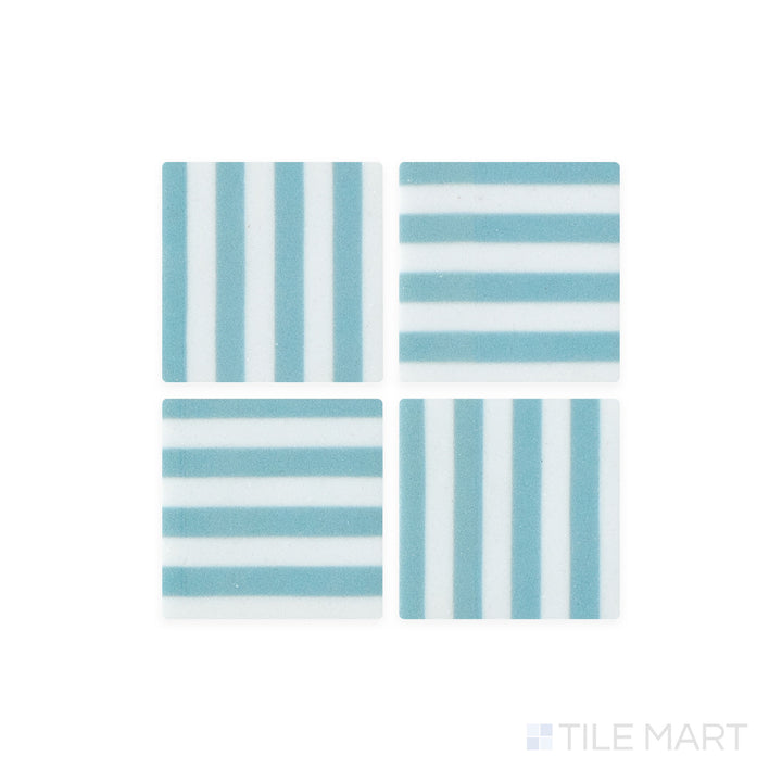 A macro view of Onix Glass - Icon Arctic Blue 2" Square Bidart Matte Mosaic tile captures its crisp arctic blue tone and velvety matte surface, adding a fresh, cool elegance.