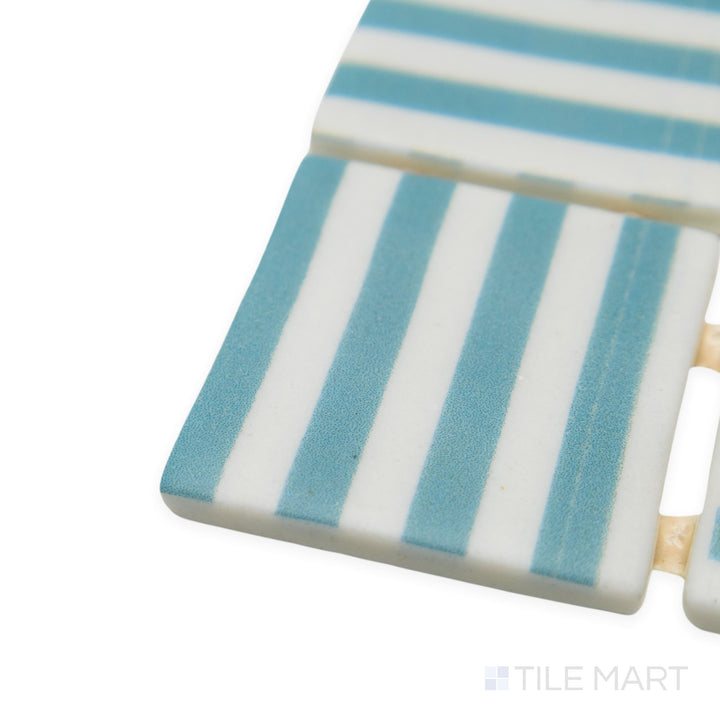 Corner-focused image of Onix Glass Icon Arctic Blue 2" square Bidart matte mosaic, highlighting its icy blue shade, finely cut edges, and smooth matte surface.