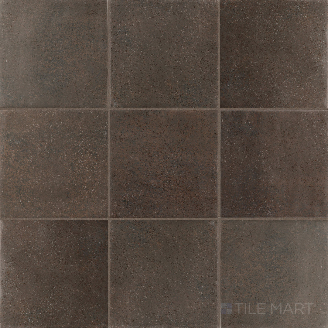Overhead image of Stage Brown 4x4 matte porcelain tile, showcasing a rich brown hue with a soft matte texture for a warm, natural look.