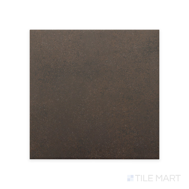 A close-up shot of Stage Brown 4X4 matte porcelain tile highlights its warm brown hue and smooth matte texture, creating a natural and earthy aesthetic.
