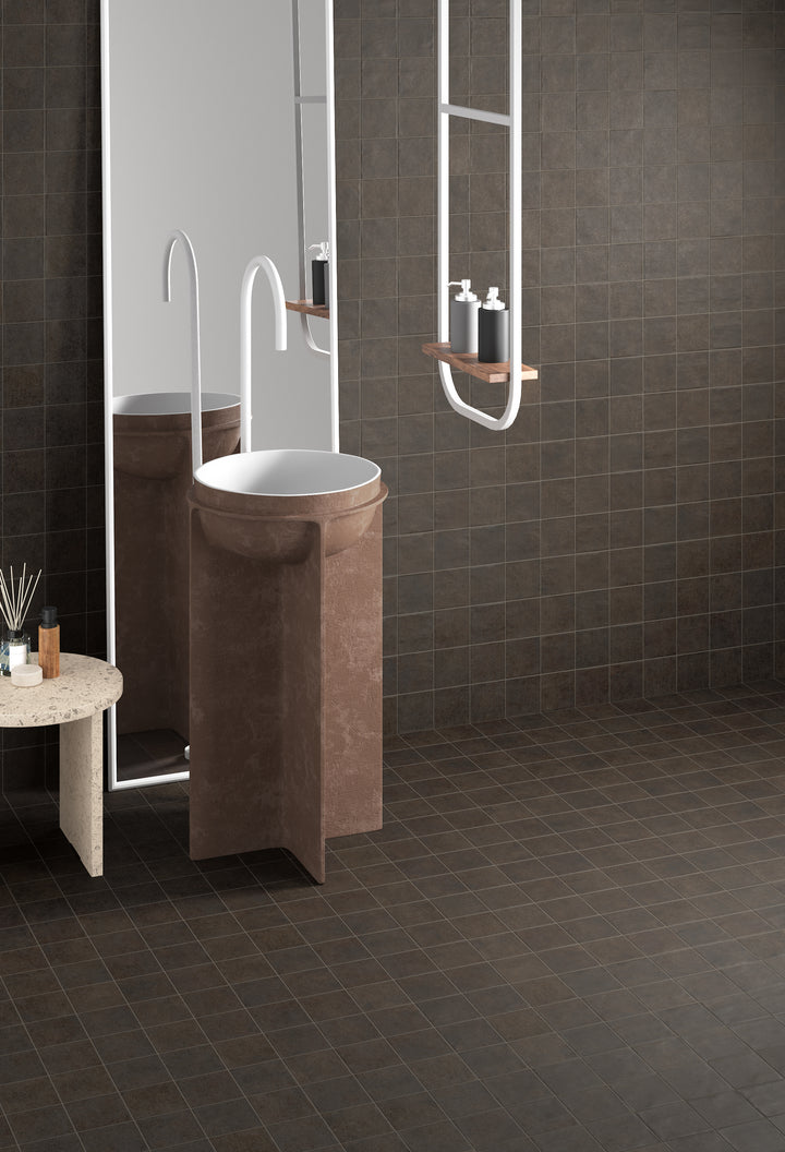 A natural and warm shade that enhances any space, featuring Stage Brown 4X4 Matte Porcelain.