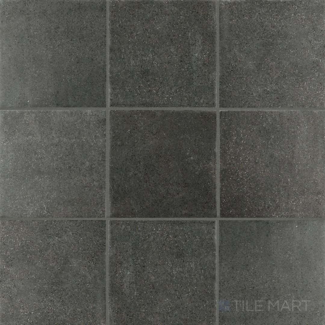 Top-down view of Stage Charcoal 4x4 matte porcelain tile, featuring a deep charcoal tone with a smooth matte finish for a bold, modern aesthetic.