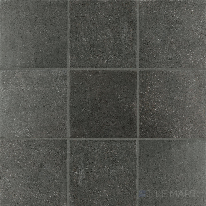 Top-down view of Stage Charcoal 4x4 matte porcelain tile, featuring a deep charcoal tone with a smooth matte finish for a bold, modern aesthetic.