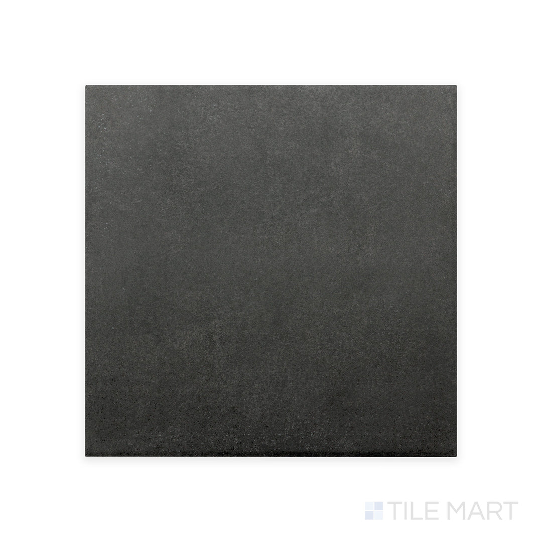 Zoomed in to showcase its deep tone, the Stage Charcoal 4X4 matte porcelain tile reveals a rich charcoal shade with a refined matte finish for a bold, modern touch.