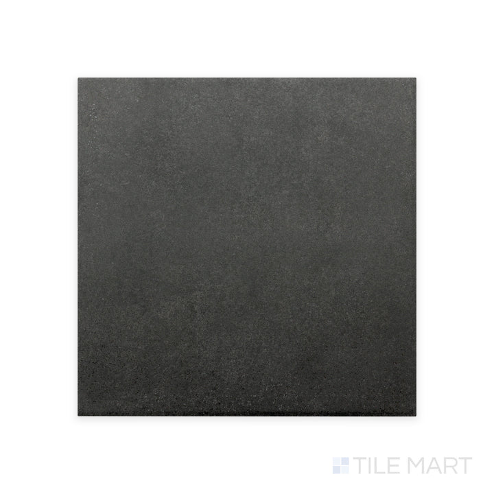 Zoomed in to showcase its deep tone, the Stage Charcoal 4X4 matte porcelain tile reveals a rich charcoal shade with a refined matte finish for a bold, modern touch.