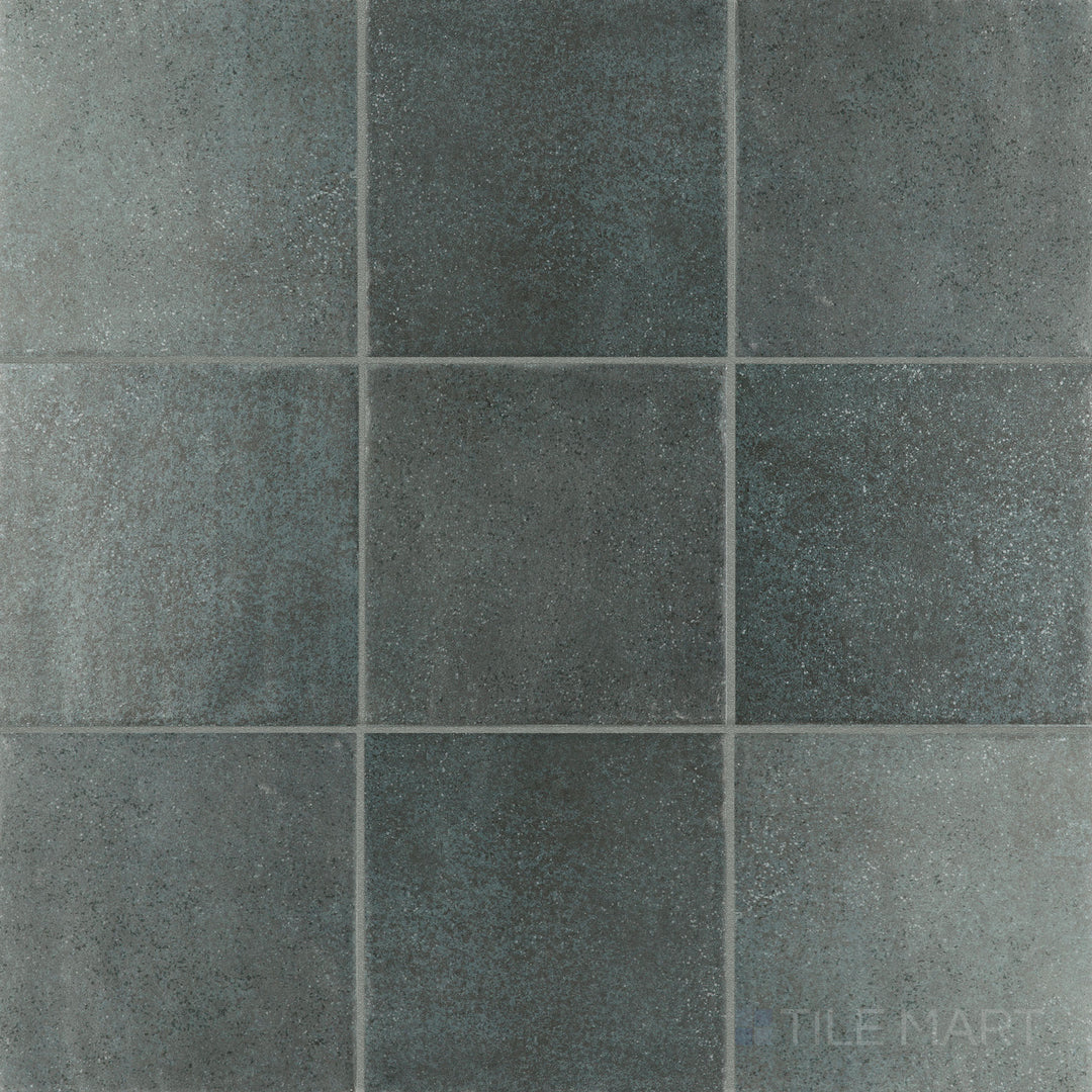 Top-view photo of Stage Denim 4x4 matte porcelain tile, displaying a deep blue tone with a matte finish for a stylish, modern touch.