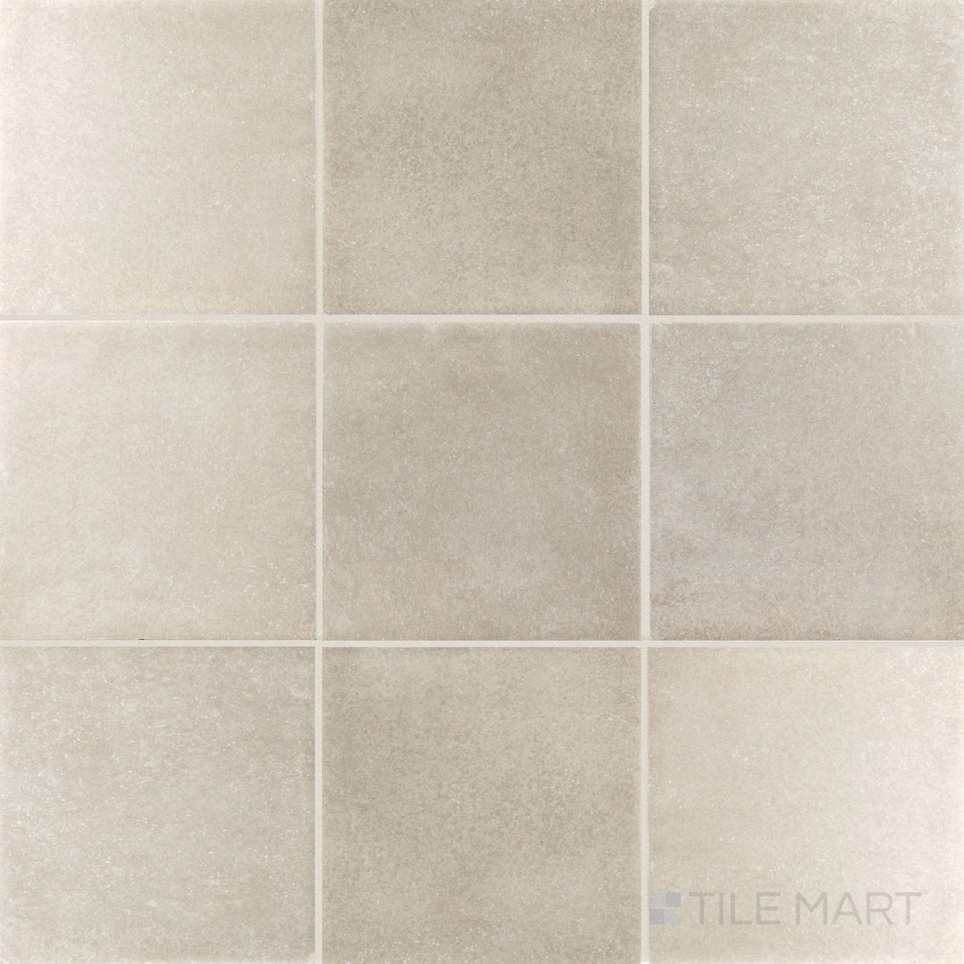 Flat-lay image of Stage Taupe 4x4 matte porcelain tile, offering a versatile taupe color with a matte finish for a soft, elegant look.