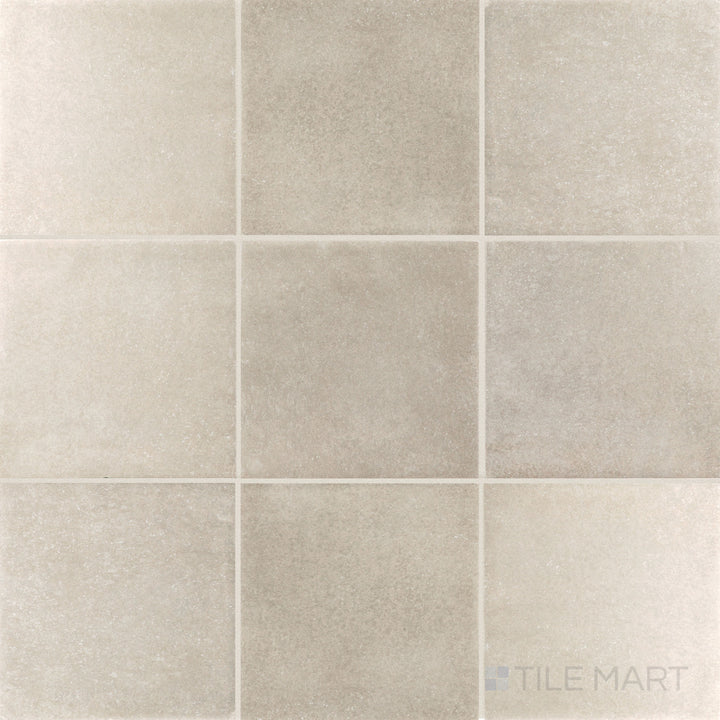 Flat-lay image of Stage Taupe 4x4 matte porcelain tile, offering a versatile taupe color with a matte finish for a soft, elegant look.