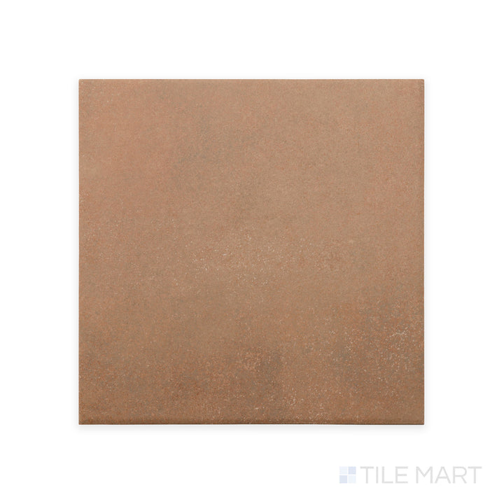 A close-up perspective of Stage Terracotta 4X4 matte porcelain tile captures its rich, earthy tone and fine matte surface, adding warmth and character to any space.
