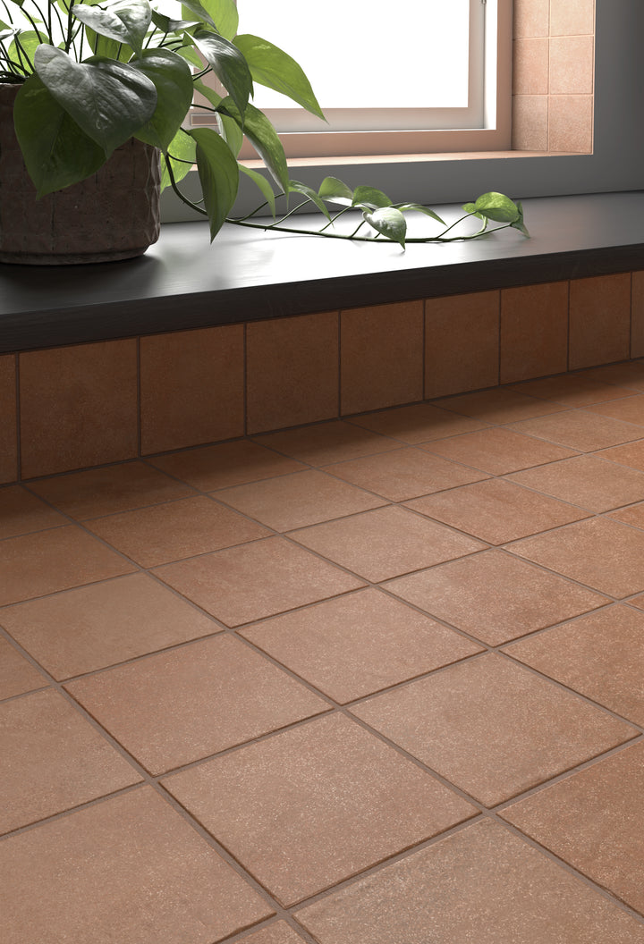 A rich and rustic tone that creates an organic aesthetic, complemented by Stage Terracotta 4X4 Matte Porcelain.