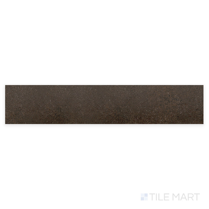 A detailed macro shot of Stage Brown 2.5X12 matte porcelain tile reveals its deep brown shade and refined matte texture, perfect for warm, rustic interiors.