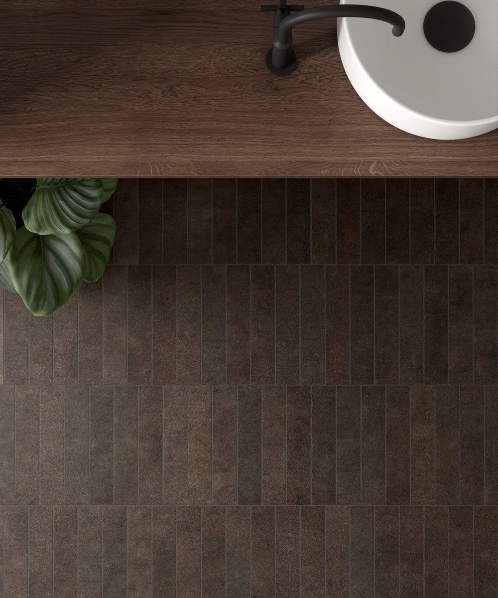 A deep and natural shade with timeless appeal, featuring Stage Brown 2.5X12 Matte Porcelain.