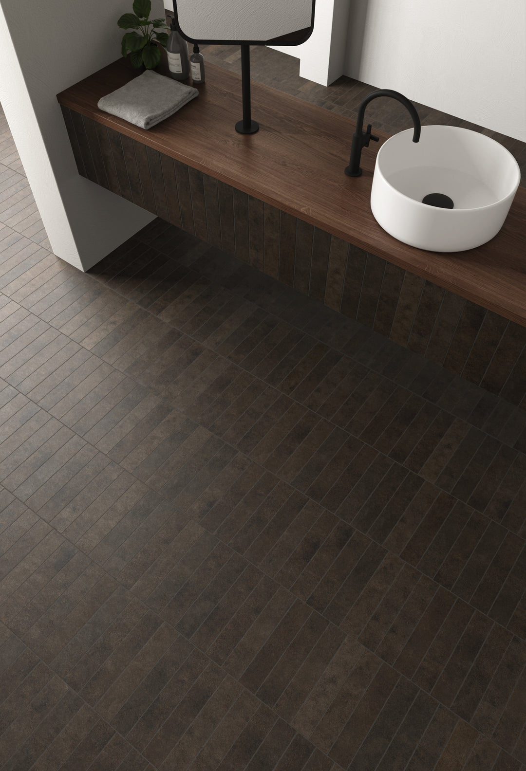 A rich, inviting atmosphere is achieved with Stage Brown 2.5X12 Matte Porcelain, adding a touch of warmth and depth to any space.