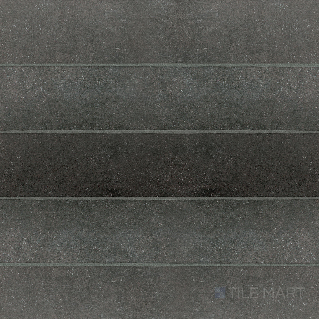 Flat-lay view of Stage Charcoal 2.5x12 matte porcelain tile, featuring a sleek charcoal color with a matte surface for a modern, bold look.