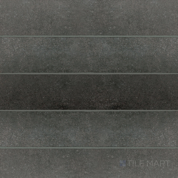 Flat-lay view of Stage Charcoal 2.5x12 matte porcelain tile, featuring a sleek charcoal color with a matte surface for a modern, bold look.