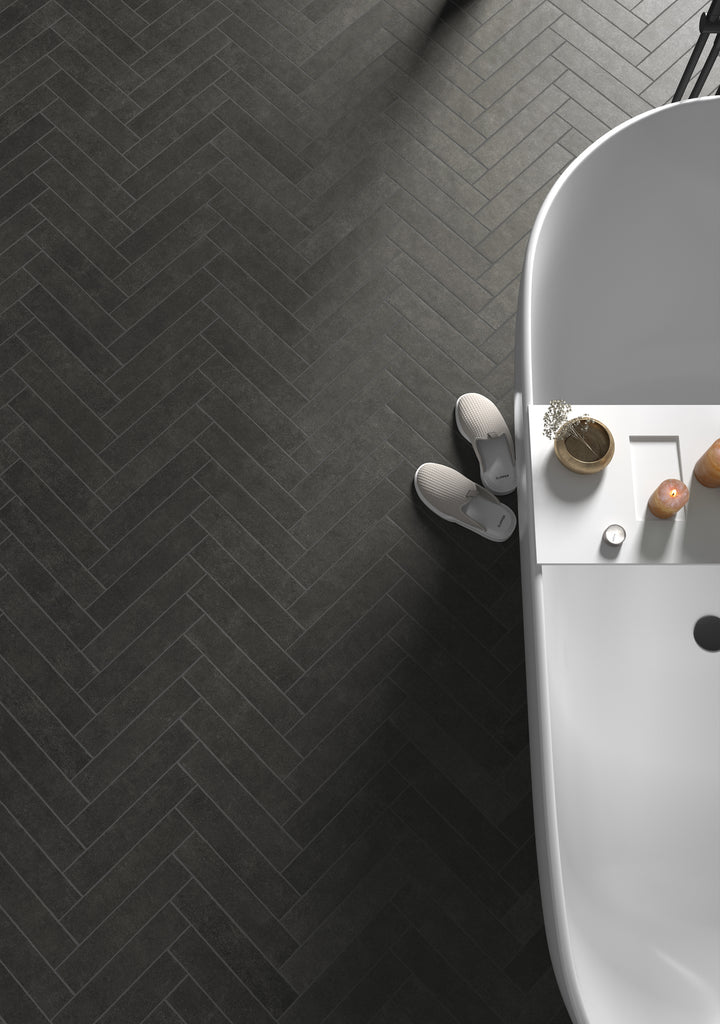 A bold and contemporary look that adds depth, highlighted by Stage Charcoal 2.5X12 Matte Porcelain.