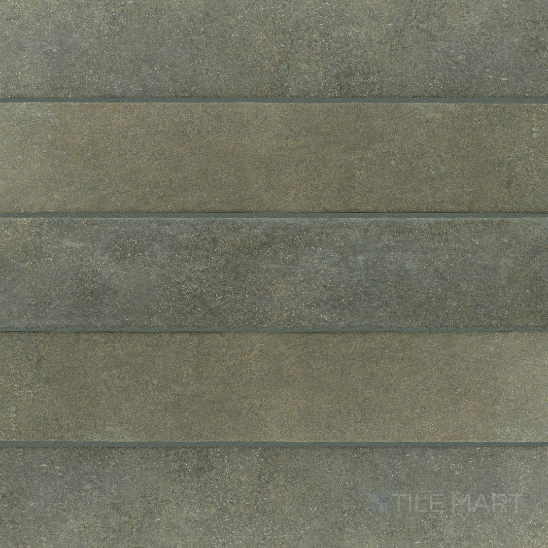 Flat-lay shot of Stage Forest 2.5x12 matte porcelain tile, featuring an organic green hue with a matte finish, ideal for natural-themed designs.