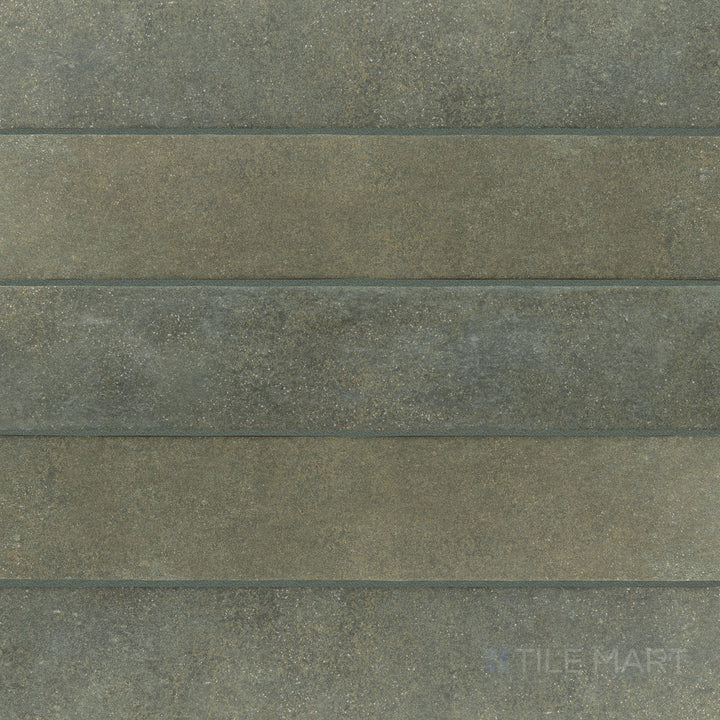 Flat-lay shot of Stage Forest 2.5x12 matte porcelain tile, featuring an organic green hue with a matte finish, ideal for natural-themed designs.