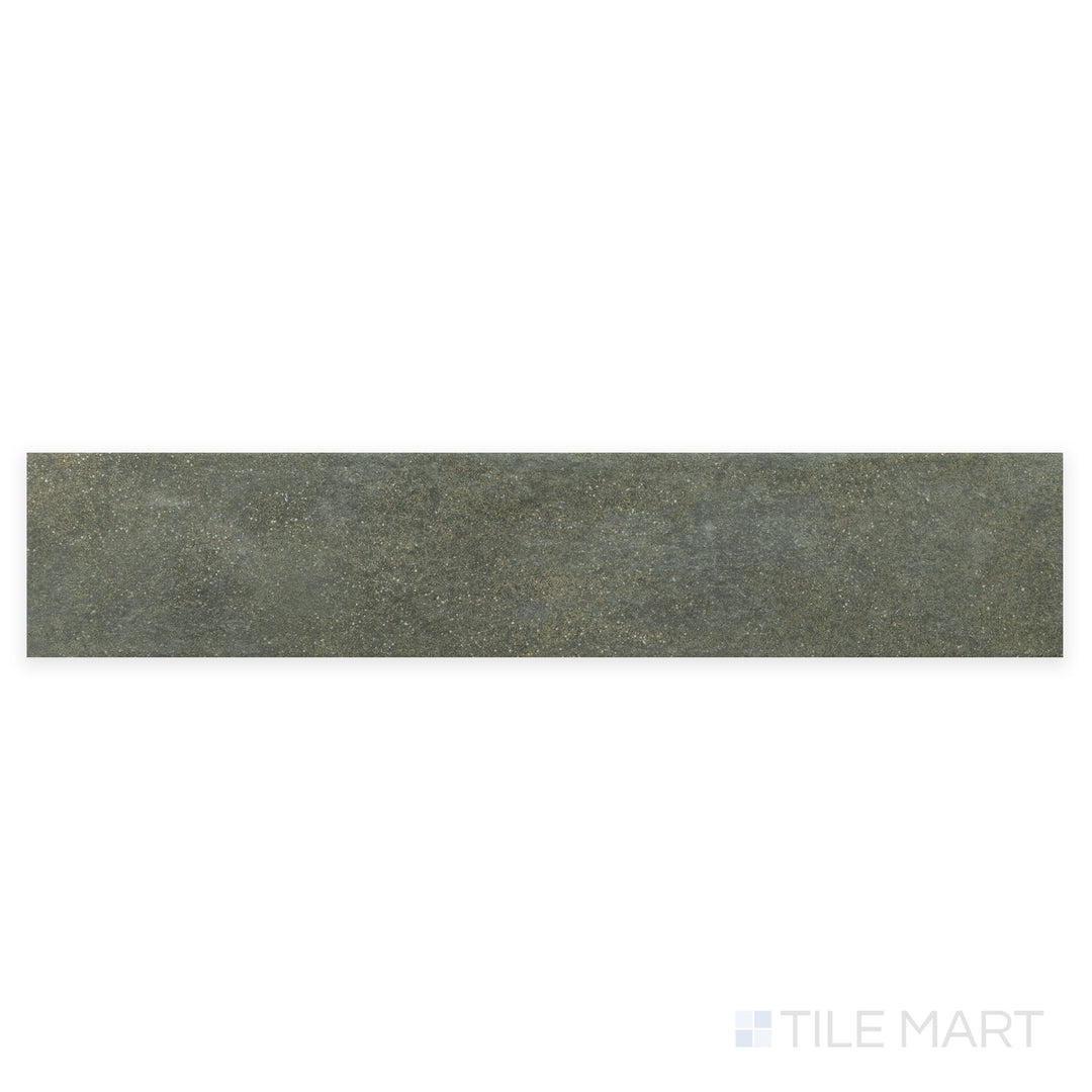 This close-up shot of Stage Forest 2.5X12 matte porcelain tile enhances its deep green shade and fine matte texture, perfect for nature-inspired designs.